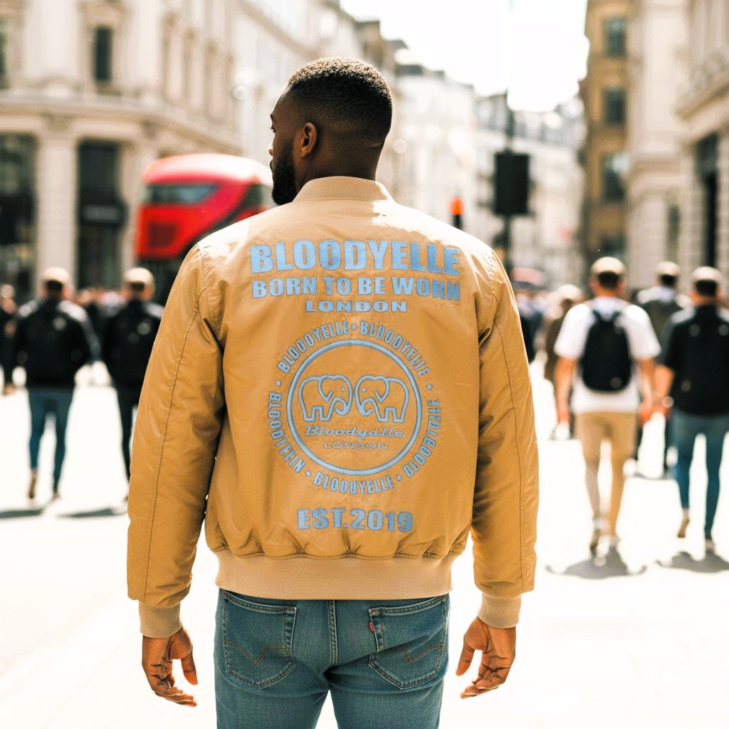 Beige Infinity Jacket with our Metallic Blue Emblem