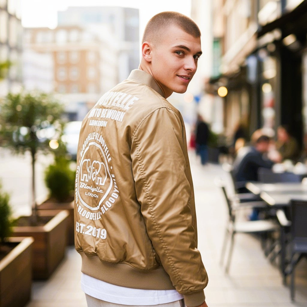 Beige Infinity Bomber Jacket with Pale Gold Metallic Emblem
